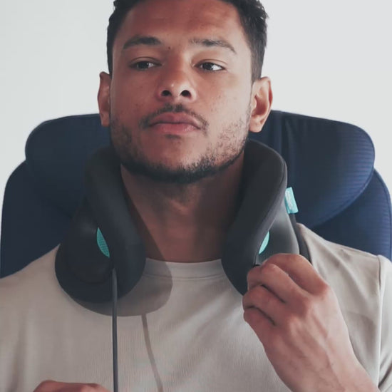 Cinching the adjustable front closure on the Evolution X Neck Pillow